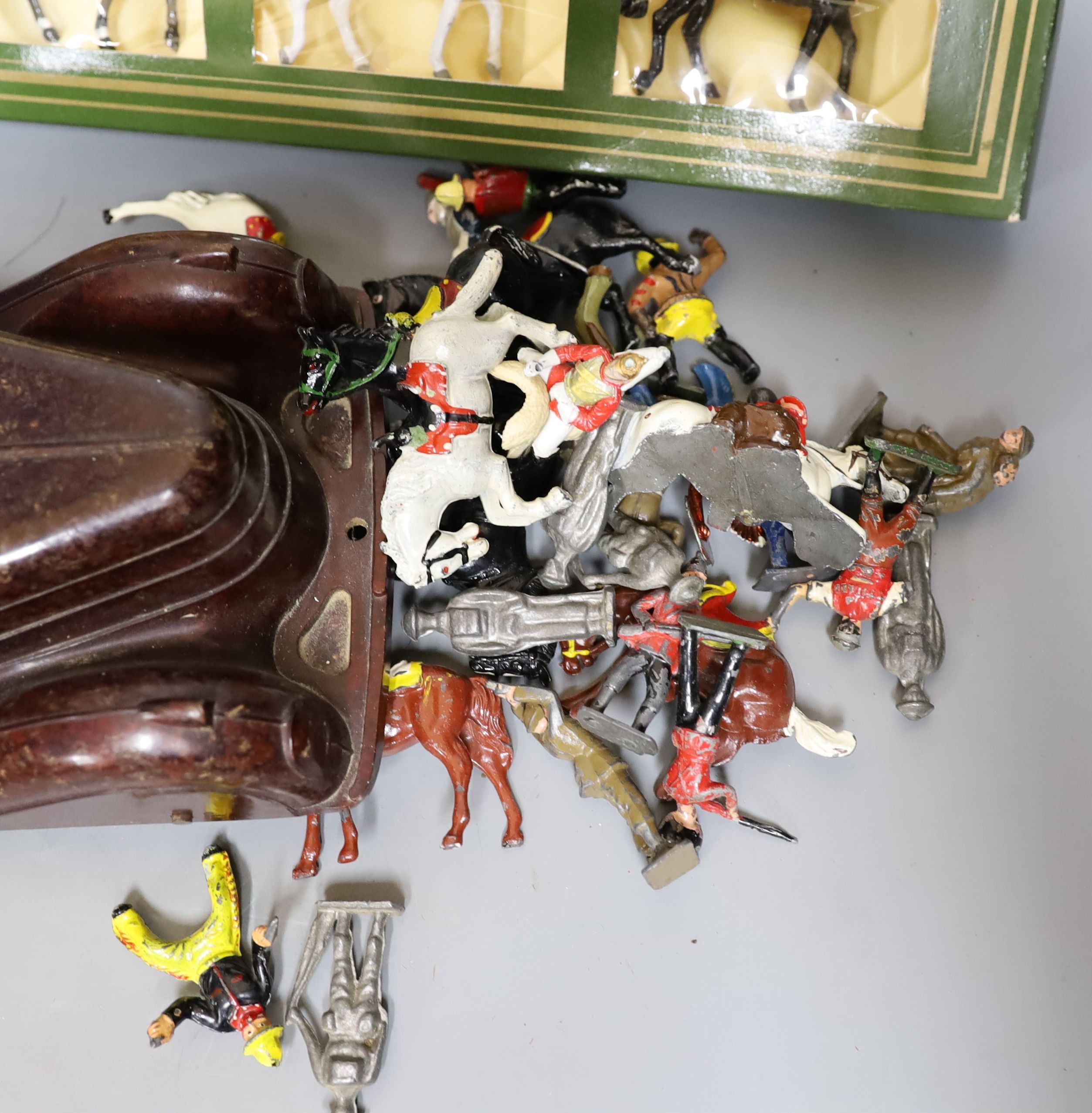 Boxed lithographed tinplate and clockwork toy rocket and various hollowcast lead toys and Bakelite coupe and clockwork monkey, monkey 24cms high.